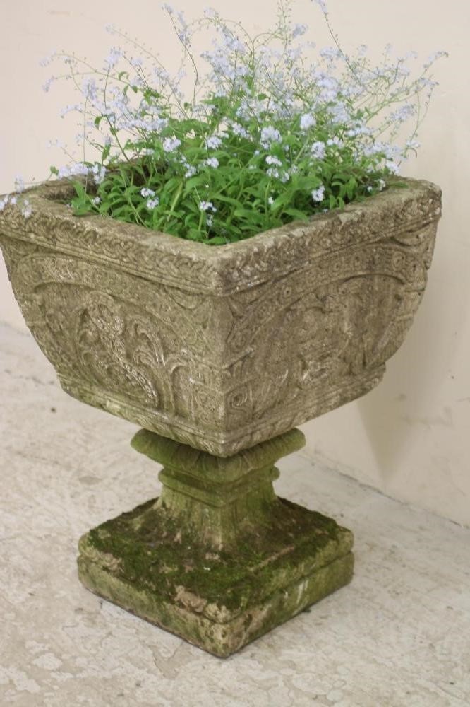 A COMPOSITION STONE JARDINIERE of square tapering form Image