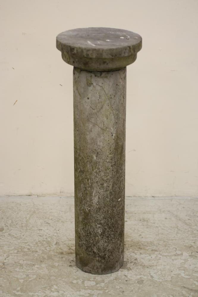 A SANDSTONE COLUMN of plain cylindrical form with stepped and moulded circular top Image