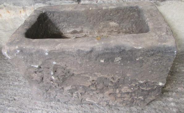 A GRITSTONE MILL TROUGH of rough hewn oblong form Image