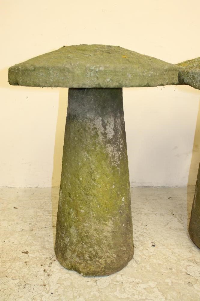 A HARLEQUIN SET OF THREE SANDSTONE STADDLE STONES Image