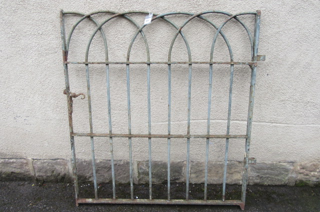 A WROUGHT IRON PEDESTRIAN GATE Image