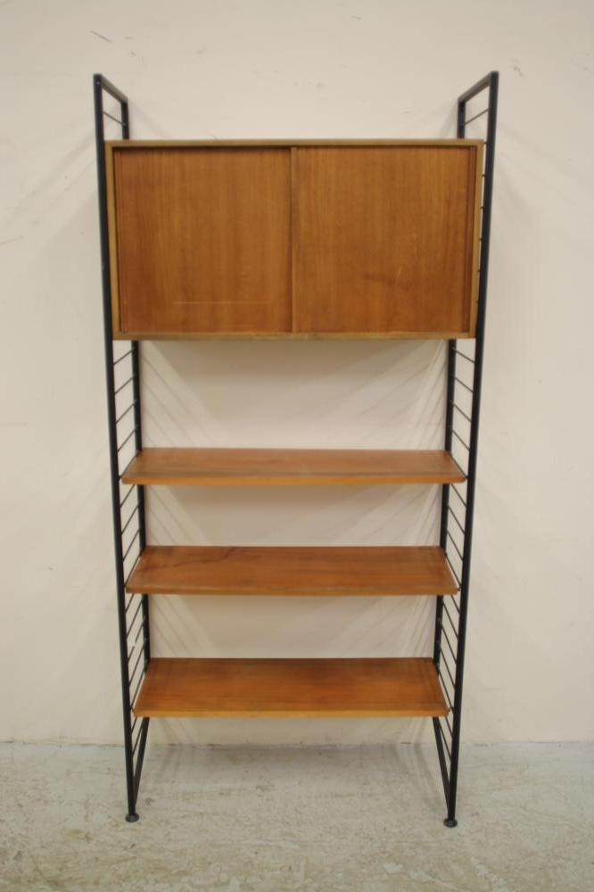A LADDERAX TEAK UNIT comprising a cupboard with two sliding doors enclosing shelving Image