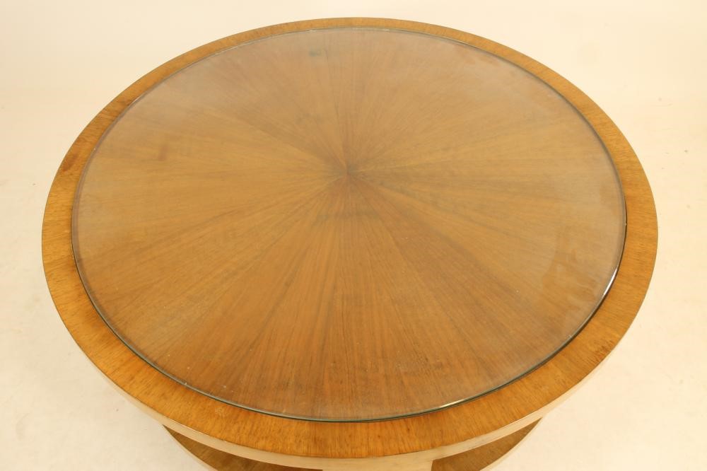AN ART DECO BIRCH COFFEE TABLE of circular form Image