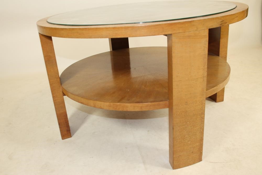 AN ART DECO BIRCH COFFEE TABLE of circular form Image