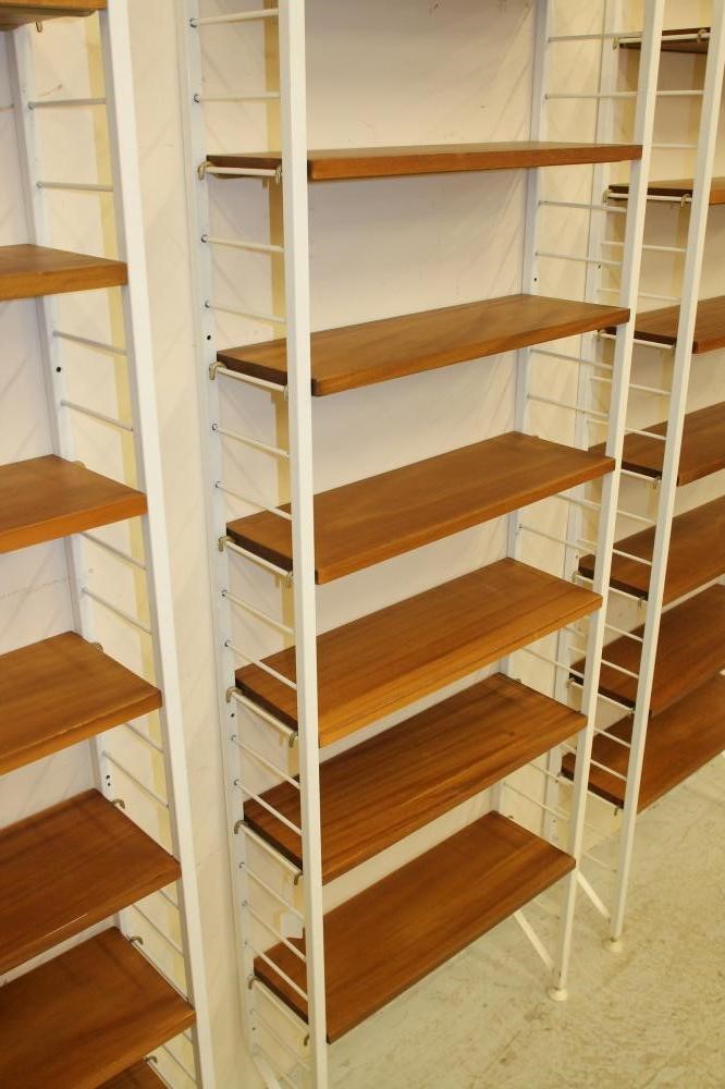 A LADDERAX TEAK SHELVING UNIT comprising twenty three open shelves Image