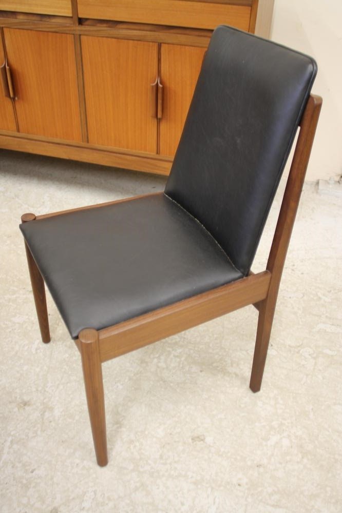 A TEAK AND ROSEWOOD BANDED DINING SUITE Image