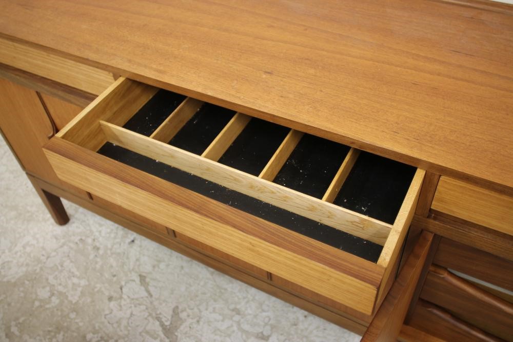 A TEAK AND ROSEWOOD BANDED DINING SUITE Image