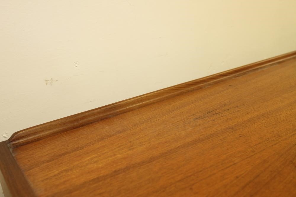 A TEAK AND ROSEWOOD BANDED DINING SUITE Image