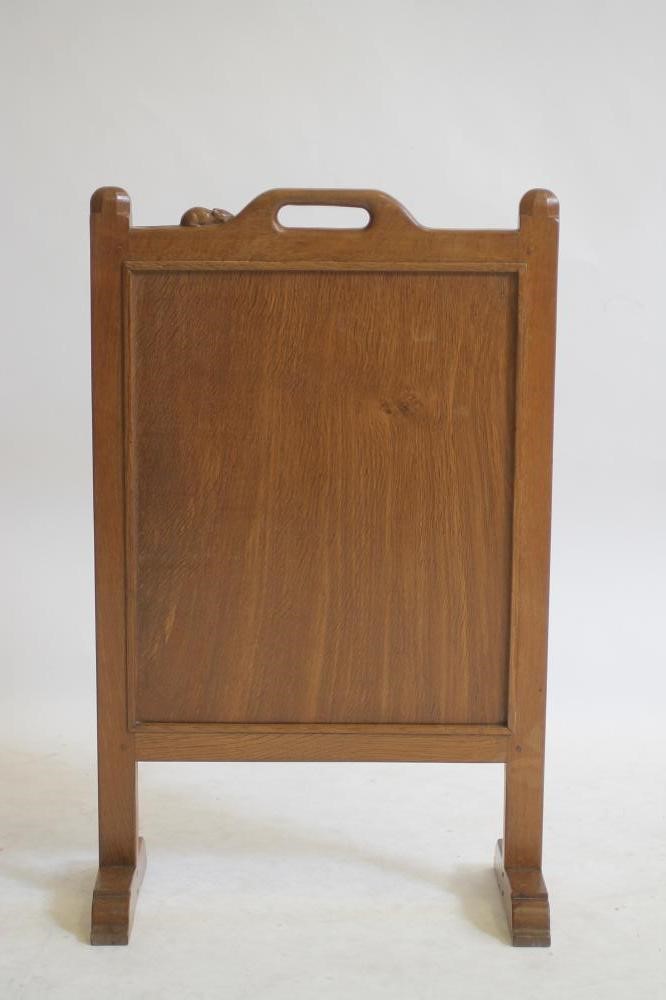AN OAK FIRESCREEN BY ROBERT THOMPSON Image