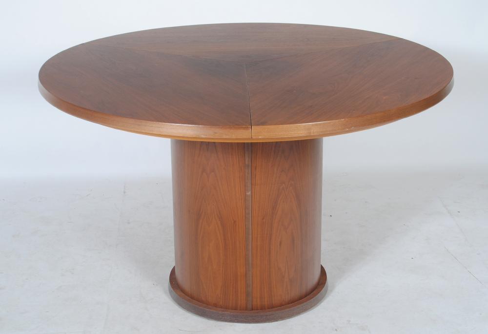 A SKOVBY OF DENMARK EXTENDING HARDWOOD DINING TABLE Image