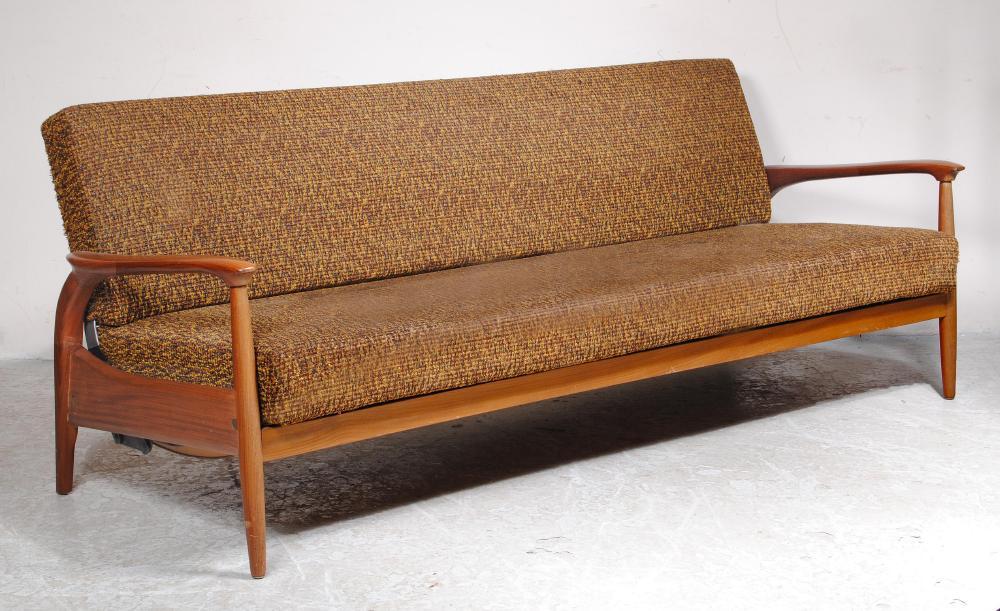 A SCANDINAVIAN DESIGN TEAK FRAMED SOFA BED Image