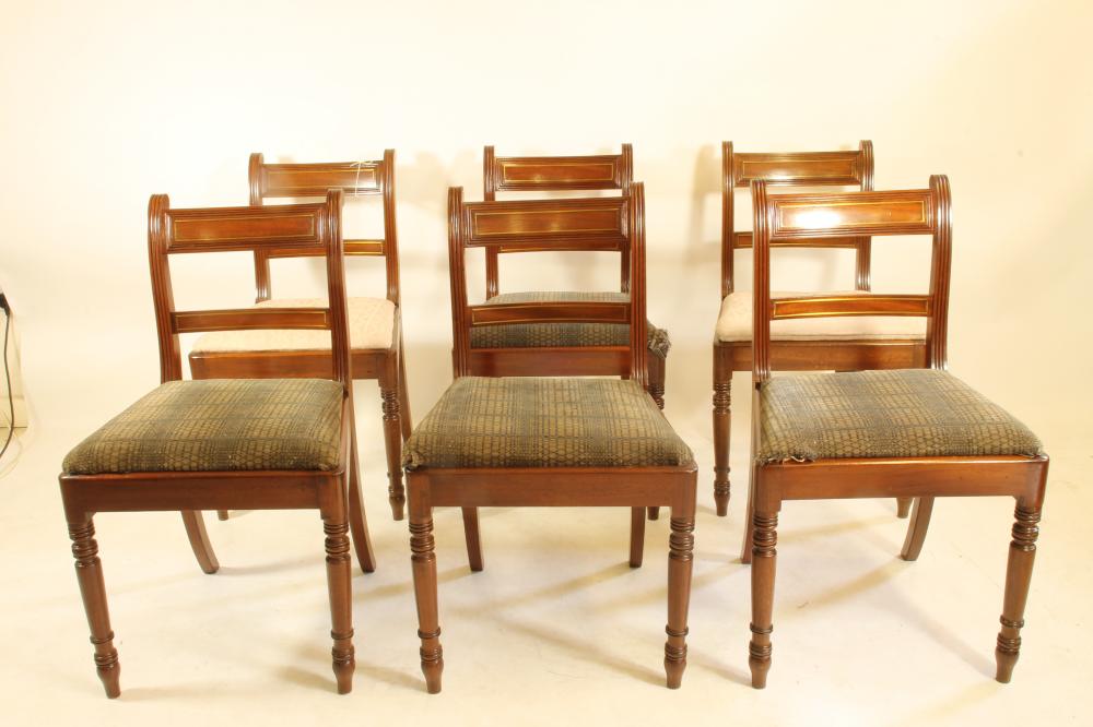 A SET OF SIX REGENCY MAHOGANY AND BRASS INLAID DINING CHAIRS Image