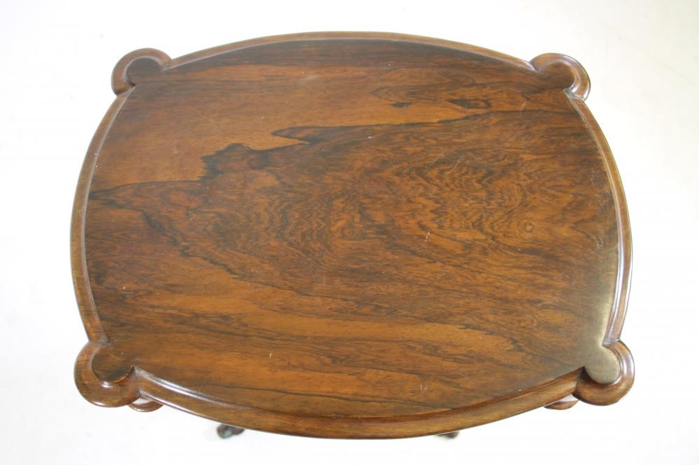 A VICTORIAN ROSEWOOD WORK TABLE of earred oval form Image