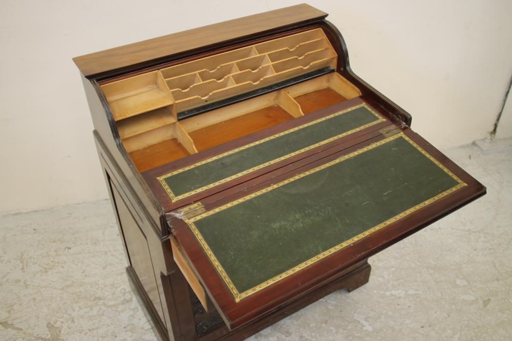 A MAHOGANY "BRADFORD DESK" by Christopher Pratt & Sons Image