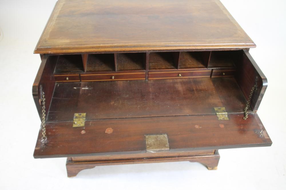 A MAHOGANY "BRADFORD DESK" by Christopher Pratt & Sons Image