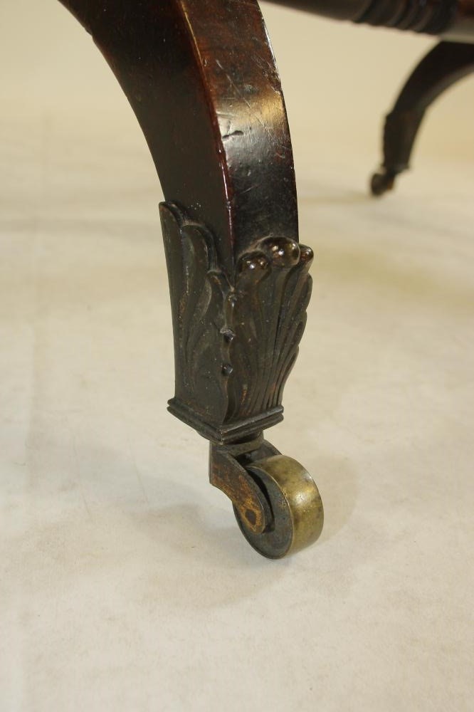 AN EARLY VICTORIAN MAHOGANY FOLDING TEA TABLE of rounded oblong form Image