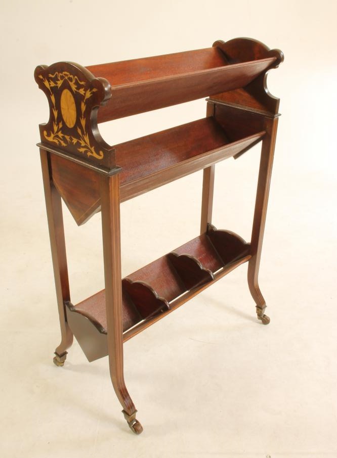 AN EDWARDIAN MAHOGANY AND INLAID  BOOK STAND of oblong form with three shelves Image