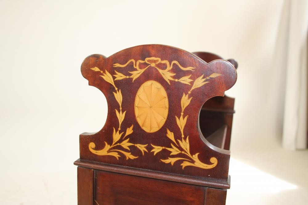 AN EDWARDIAN MAHOGANY AND INLAID  BOOK STAND of oblong form with three shelves Image