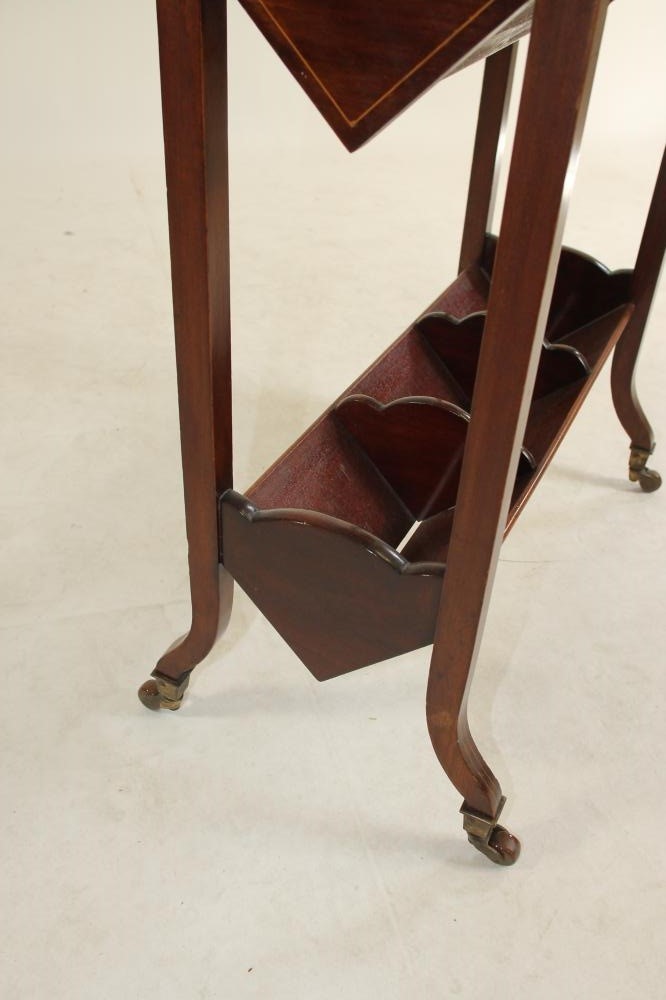 AN EDWARDIAN MAHOGANY AND INLAID  BOOK STAND of oblong form with three shelves Image