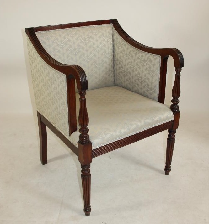 A REGENCY STYLE MAHOGANY LIBRARY CHAIR Image
