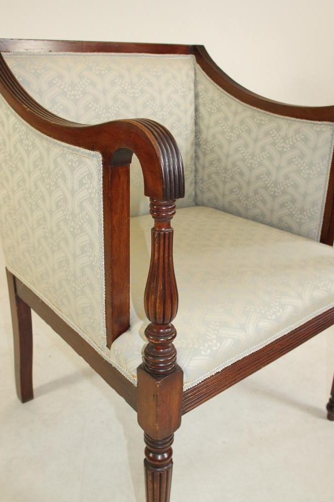 A REGENCY STYLE MAHOGANY LIBRARY CHAIR Image