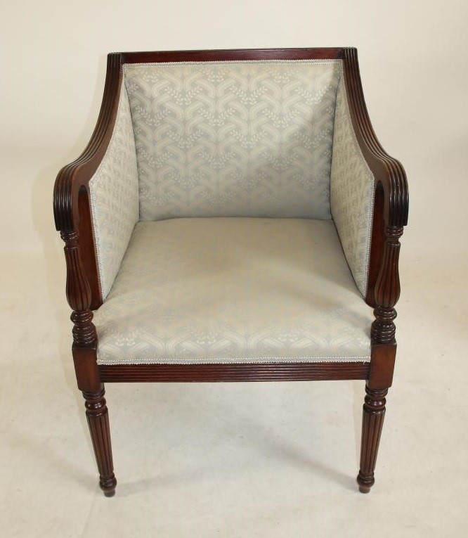 A REGENCY STYLE MAHOGANY LIBRARY CHAIR Image