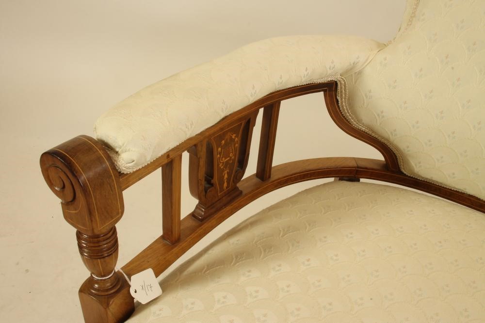 A LATE VICTORIAN ROSEWOOD SOFA of low rounded form Image