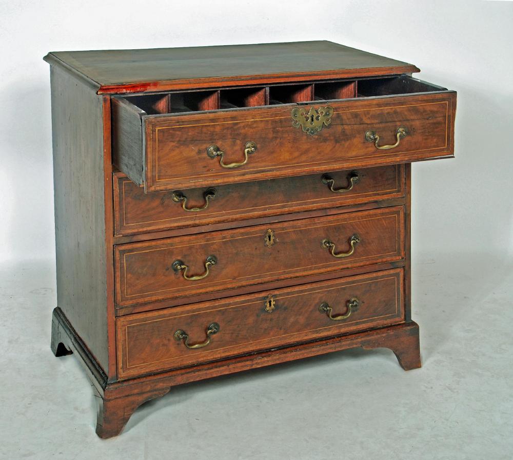 A GEORGIAN MAHOGANY SECRETAIRE CHEST Image