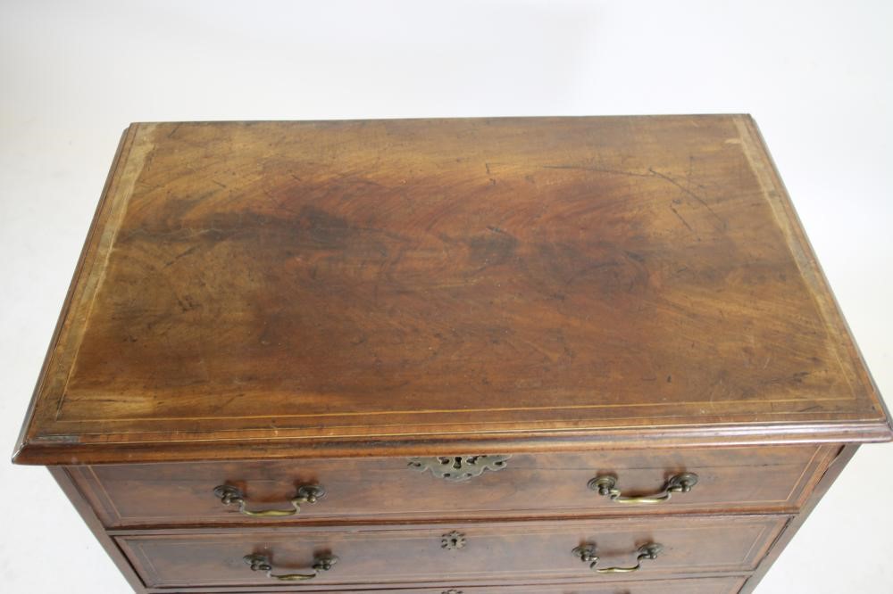 A GEORGIAN MAHOGANY SECRETAIRE CHEST Image