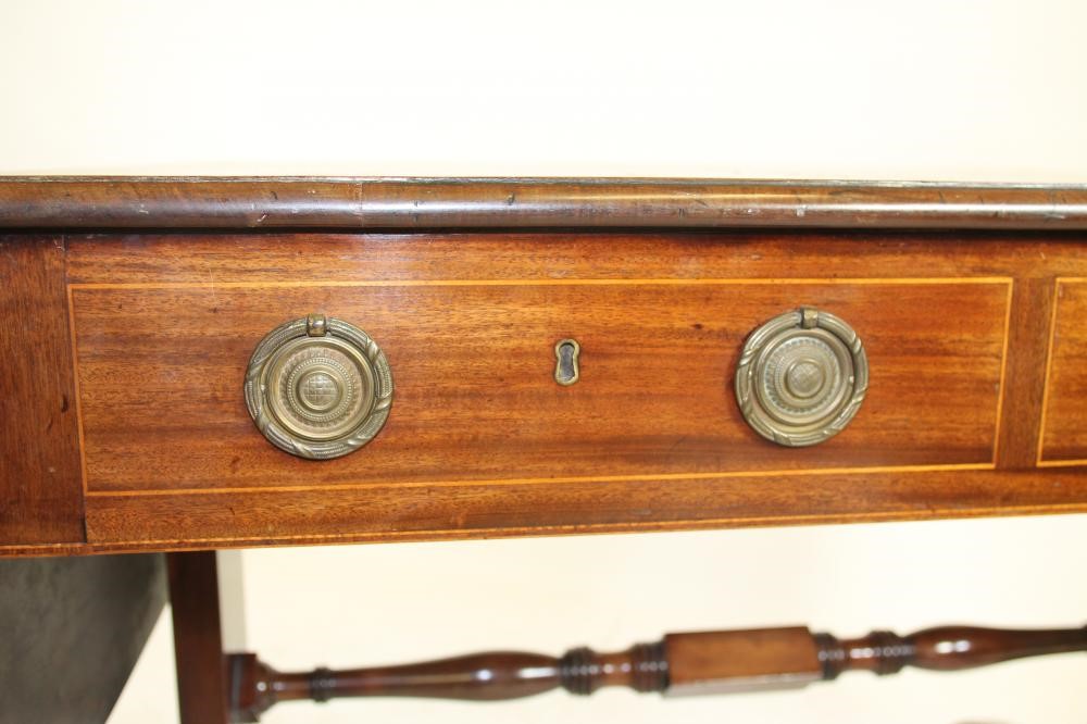 A REGENCY STYLE MAHOGANY AND SATINWOOD BANDED SOFA TABLE Image