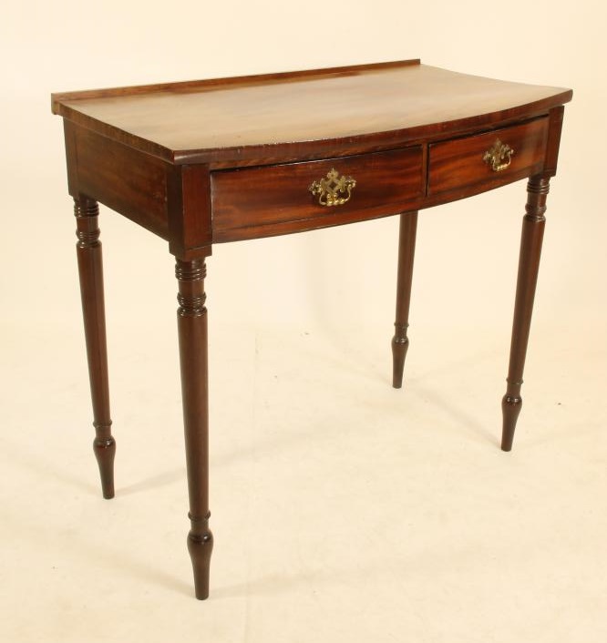A MAHOGANY DRESSING TABLE Image