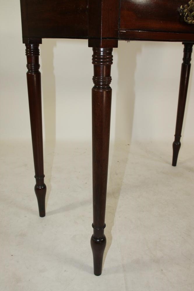 A MAHOGANY DRESSING TABLE Image