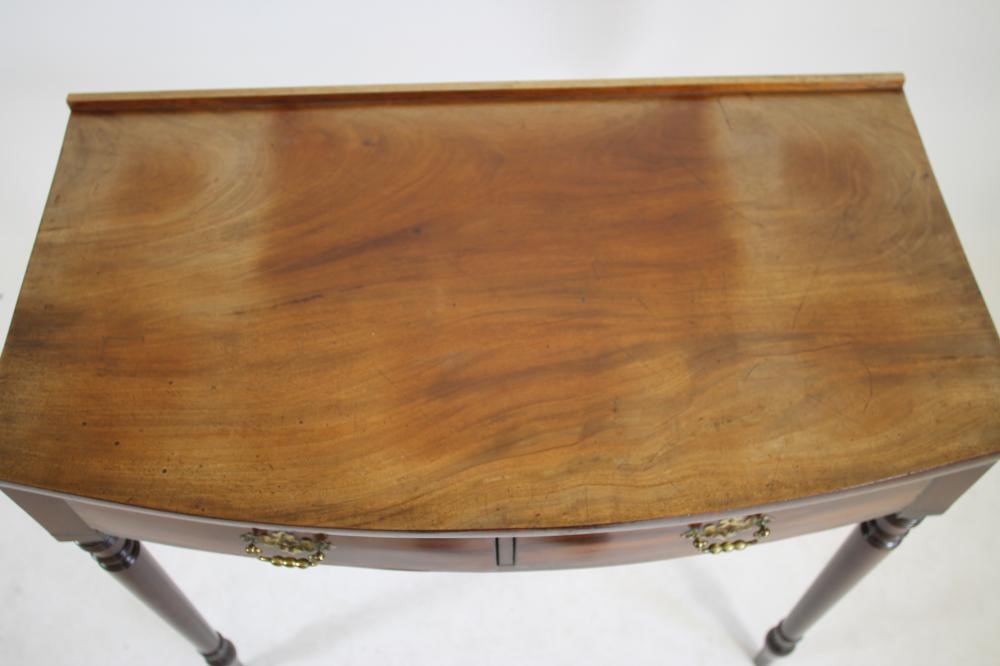 A MAHOGANY DRESSING TABLE Image