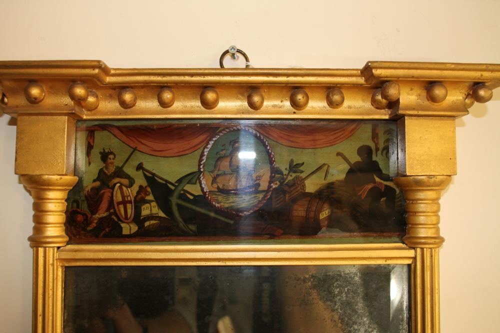 A SMALL REGENCY GILT FRAMED PIER GLASS Image