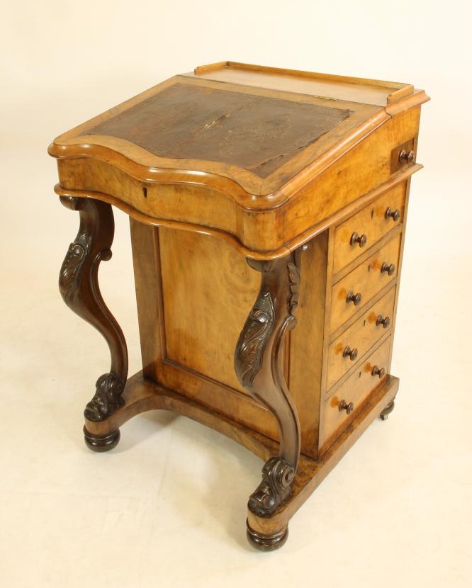 A VICTORIAN WALNUT DAVENPORT Image