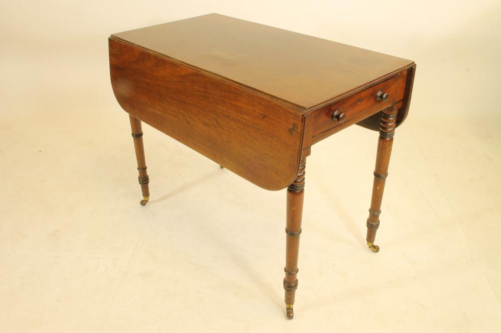 A REGENCY MAHOGANY PEMBROKE TABLE Image