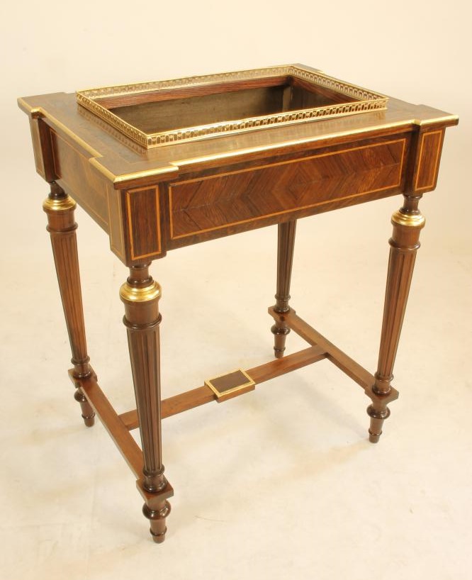 A KINGWOOD AND PARCEL GILT JARDINIERE STAND Image