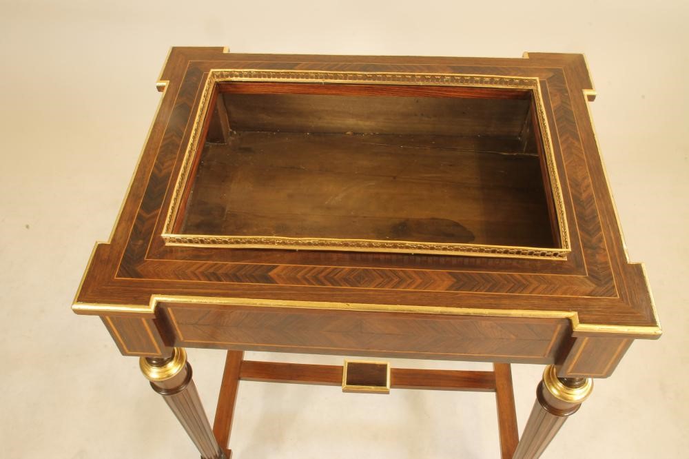 A KINGWOOD AND PARCEL GILT JARDINIERE STAND Image