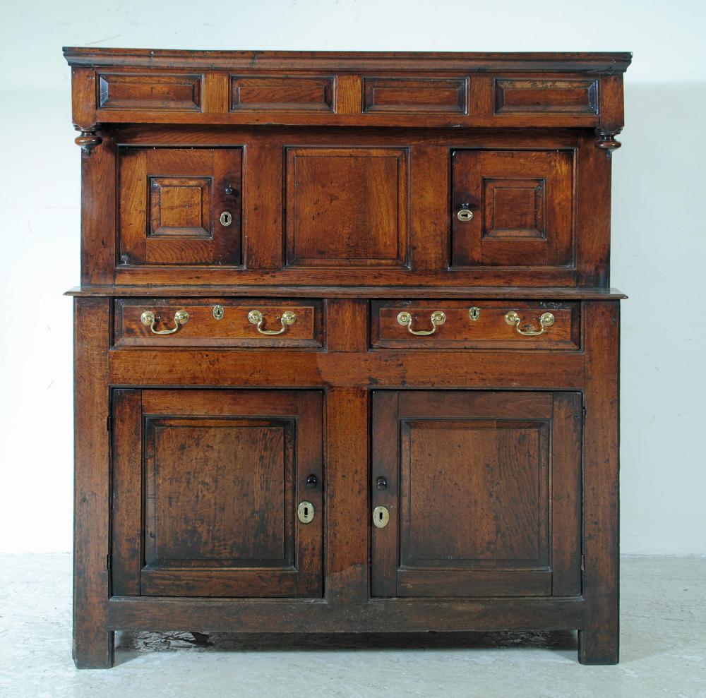 AN OAK PRESS CUPBOARD Image