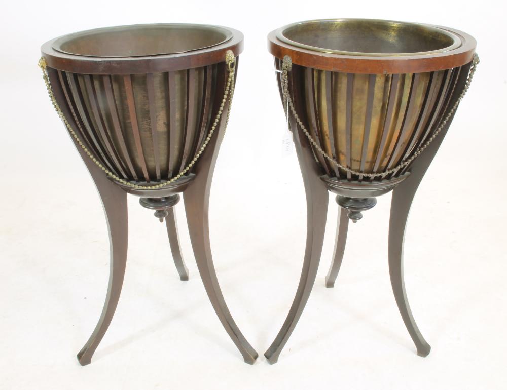 A PAIR OF EDWARDIAN MAHOGANY JARDINIERES by James Shoolbred & Co. Image