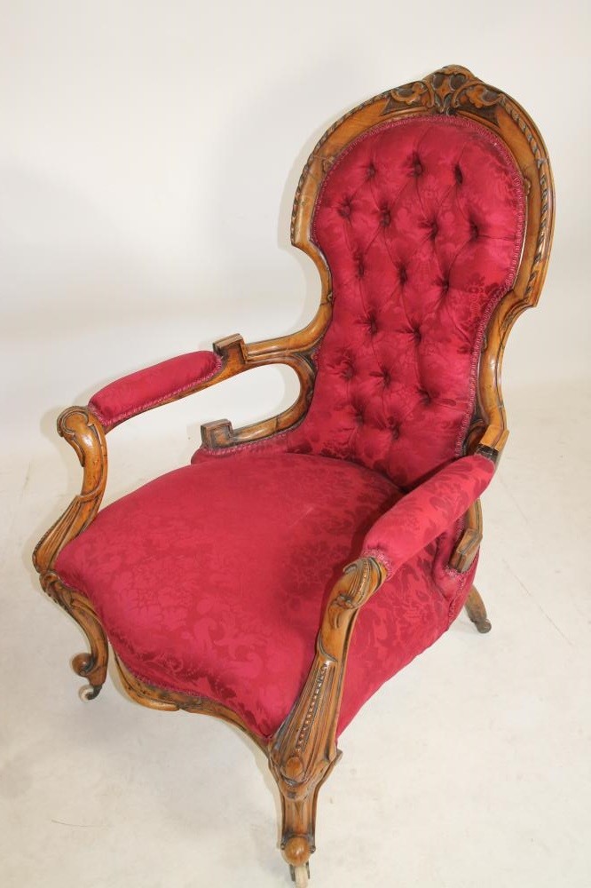 A PAIR OF VICTORIAN CARVED WALNUT SALON CHAIRS FOR A LADY AND GENTLEMAN Image