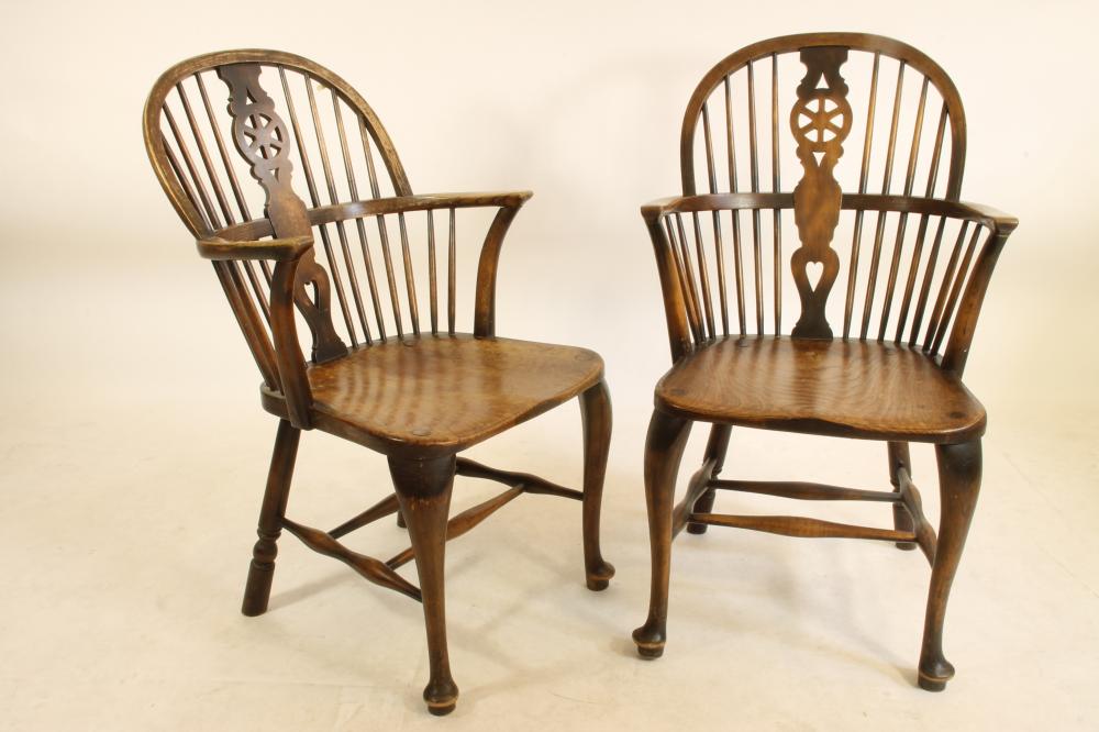 A PAIR OF ASH AND ELM WINDSOR ARMCHAIRS by Waring & Gillow Image
