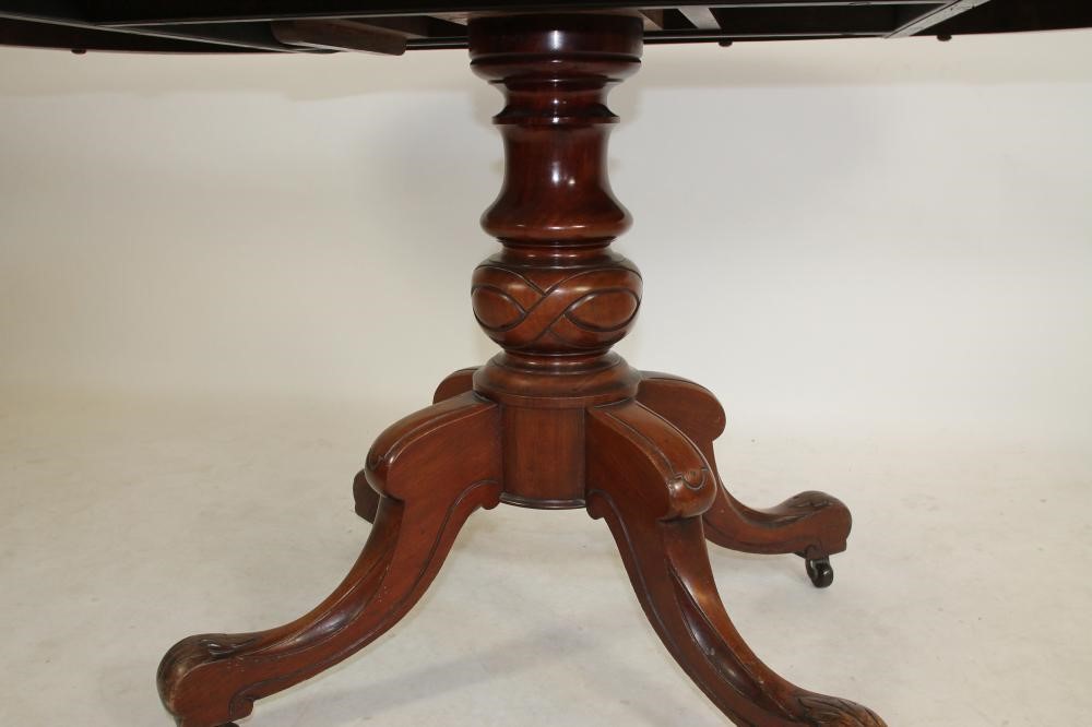 A VICTORIAN WALNUT LOO TABLE Image