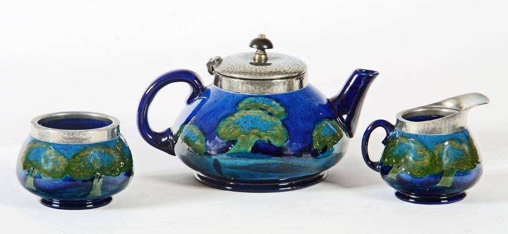 A MOORCROFT POTTERY THREE PIECE TEA SERVICE Image
