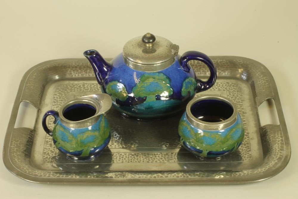 A MOORCROFT POTTERY THREE PIECE TEA SERVICE Image