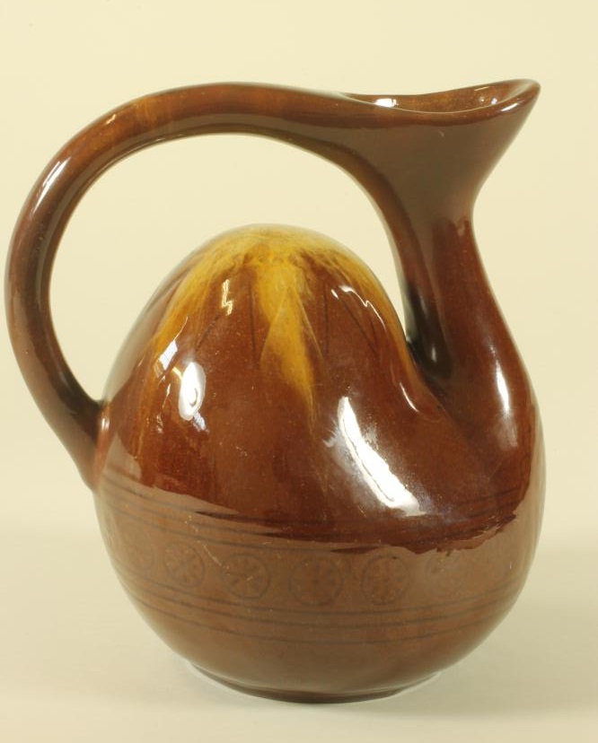AN EARTHENWARE "CAMEL" JUG Image