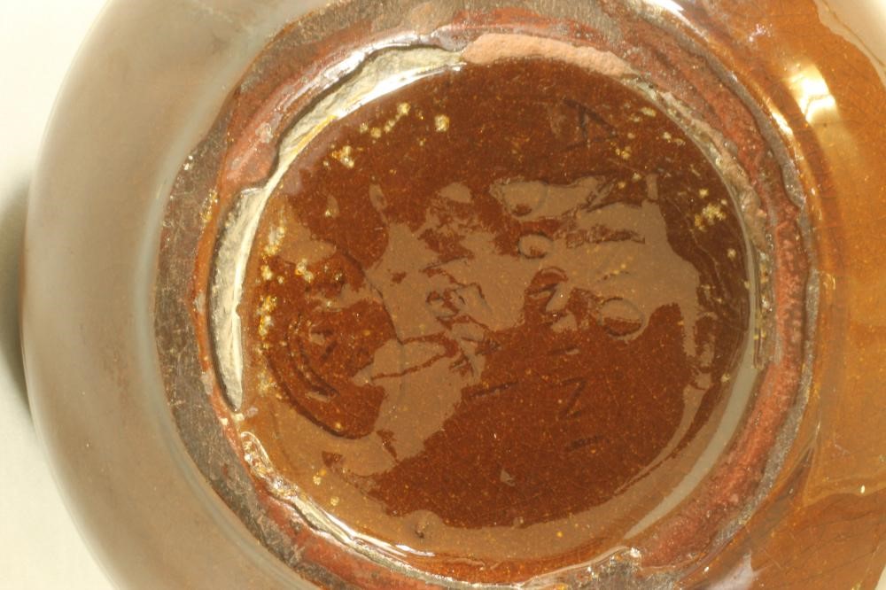 AN EARTHENWARE "CAMEL" JUG Image