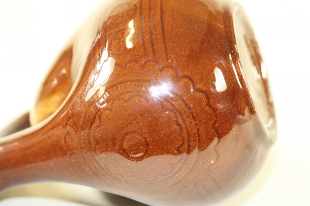 AN EARTHENWARE "CAMEL" JUG Image
