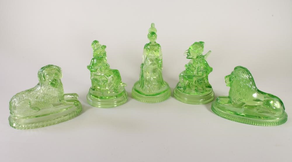 A COLLECTION OF FIVE J. DERBYSHIRE PRESSED GREEN GLASS FIGURES AND MODELS Image
