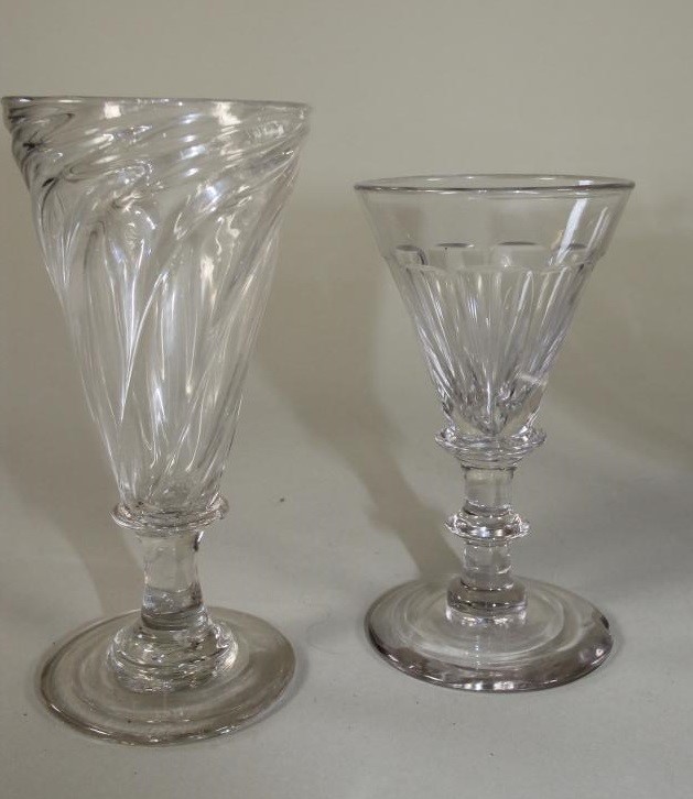 FOUR GEORGIAN AND LATER GLASSES comprising a "Somerset Ale" with wrythen fluted conical bowl Image